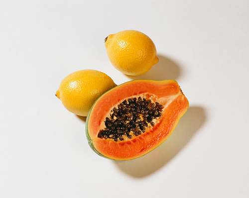 fruit yellow papaya and two lemons plant